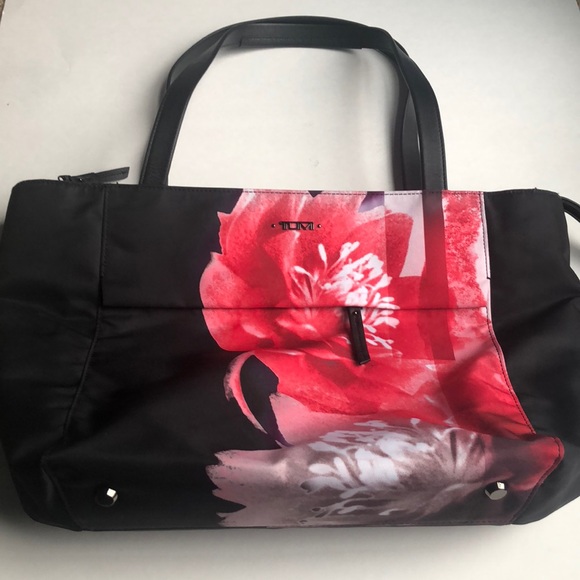 tumi floral luggage